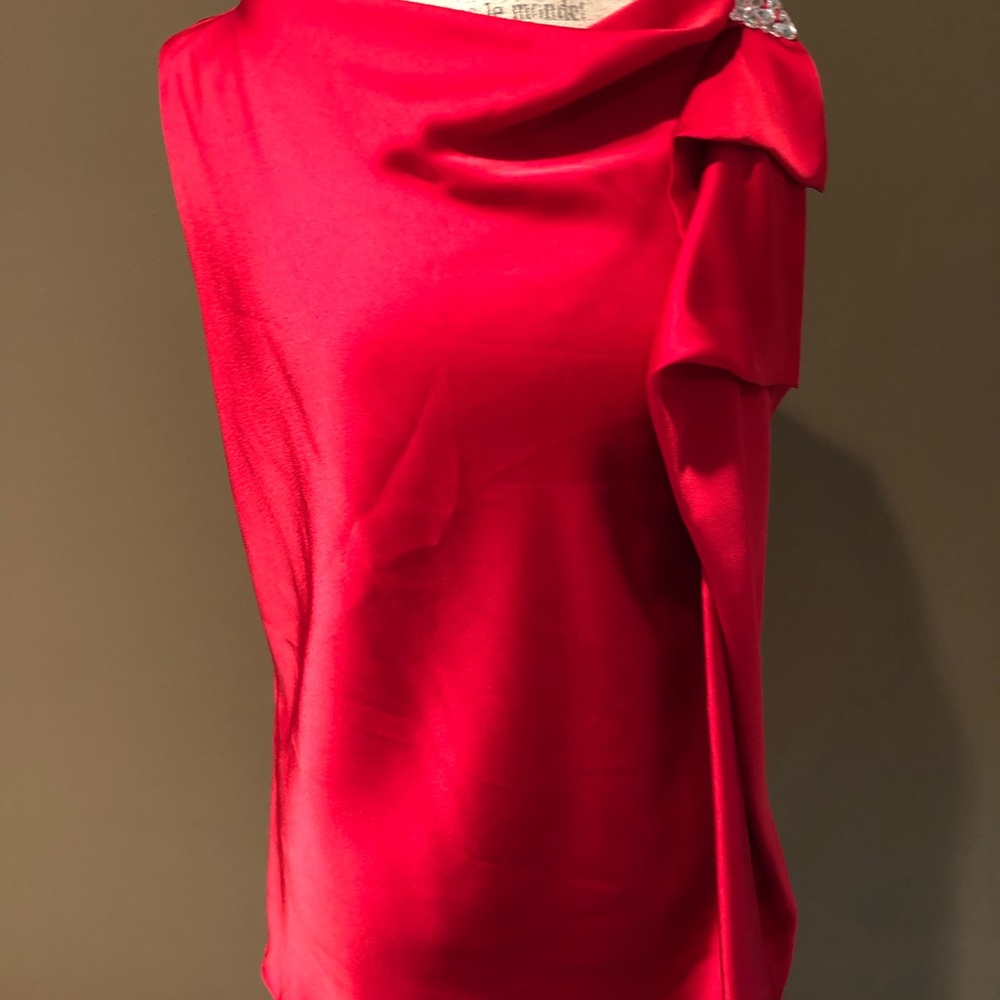 Festive red blouse.